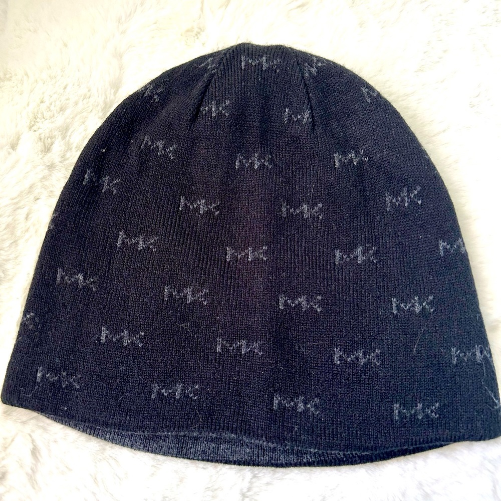 New without tags Micheal Kirs black beanie for men or women.
